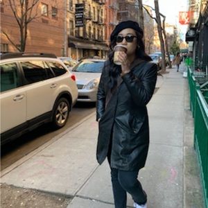 Black genuine leather mid length coat, purchased in a small Italian town for 500